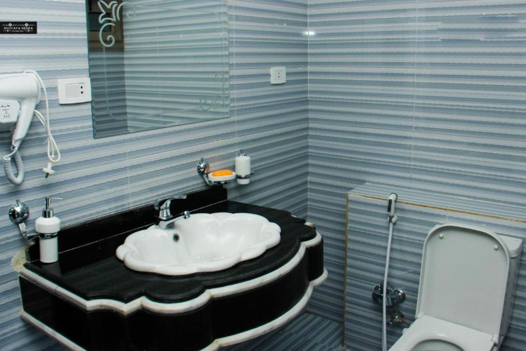 Aswan Plaza - Share Apartment ภายนอก รูปภาพ